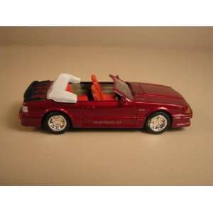  1989 Ford Mustang GT Metallic Red 1:43: Toys & Games