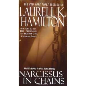   Hunter, Book 10) [Mass Market Paperback]: Laurell K. Hamilton: Books