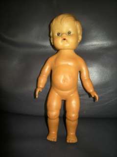 Adorable dark skinned rubber vintage boy doll Sun?  