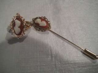 Ring in excellent condition, stick pin missing one seed pearl on right 