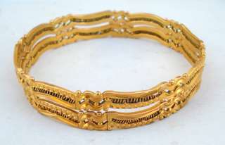 Material   21 carat solid gold and original old worn bangles 