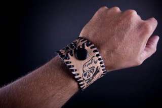 LEATHER WRISTBAND WITH *REAL* TATTOO BLACK SKULLS ROW  