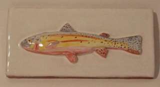 Glossy White Background And Hand Painted Fish.