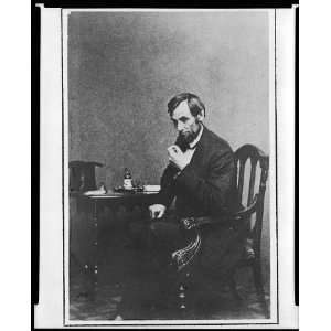 President Abraham Lincoln,small table,reflective,hat,Mathew Brady 