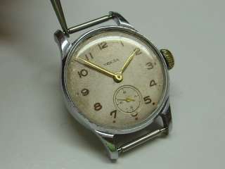 The watch is in good cosmetic condition. The mechanisms are fully 