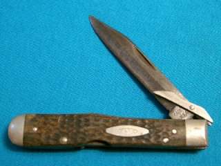   77 CASE XX 6111 1/2L BONE CHEETAH SWING GUARD FOLDING DIRK BOWIE KNIFE