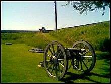 six pounder field gun and, in the background, the 24 pounder gun at 