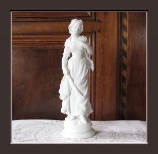   STATUE BISCUIT DE PORCELAINE H. MOREAU JEUNE FEMME / SEVRES