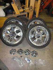   chrome steel rims and tires, 8 lug Chevy truck wheels w/ center caps